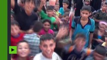 Des civils fêtent la fin du siège de Daesh à Deir ez-Zor, en Syrie