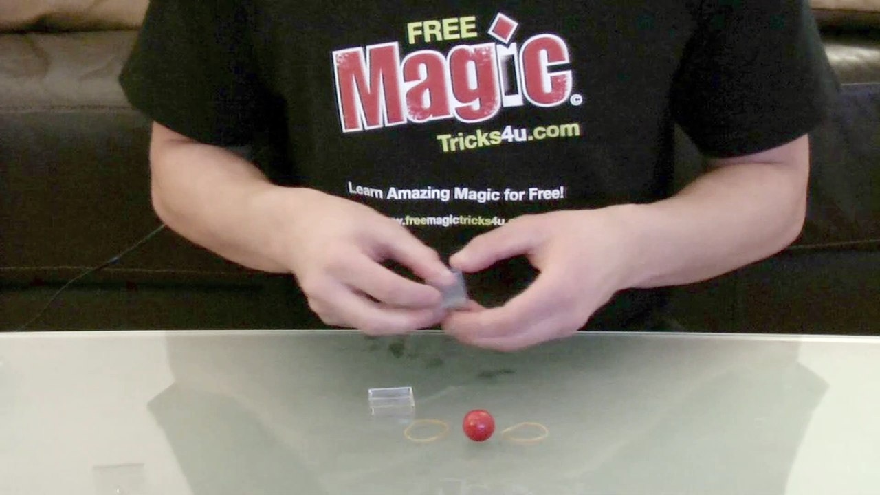 Ball Through Box Magic Trick