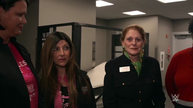 Apollo Crews & Nia Jax do a cheer for their WWE MMC charity partner Susan G. Komen