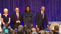 الكشف عن رسمي بورتريه لباراك أوباما وزوجته بمتحف واشنطن الشهير