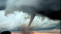 A Perfect, Huge Tornado Ravages The Landscape, Spreading Disaster And Destruction. Dust_ Debris Are Thrown As Tornado Touches Down. Perfect For Videos About Tornadoes, Storms, Funnel Clouds, Nature, Stock Footage Video 5742650 - Shutters
