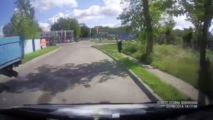Biker lands between two crashing cars || ViralHog