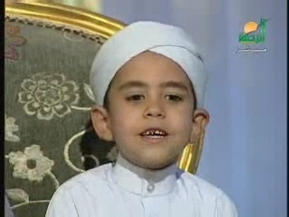Enfant moslim Said qui récit le poême Sawt safir Bolboli