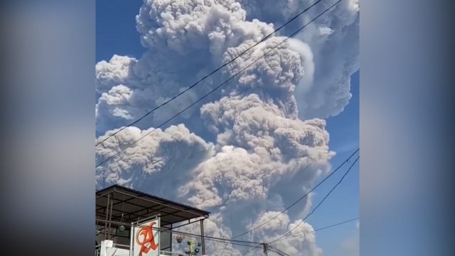 Mount Sinabung erupts and spews massive columns of ash into sky