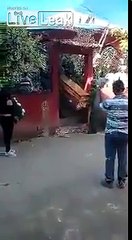 Body gets dropped out of a coffin. One of the people from the helicopter crash in Mexico.