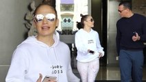 Jennifer Lopez flaunts her famous derriere in skintight leggings as she hits the gym with beau Alex Rodriguez.