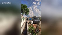 Indonesia's Mt Sinabung volcano erupts sending huge ash cloud into air