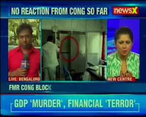 Former Congress President of KR Puram block, Narayanswamy tries to set the BBMP office on fire