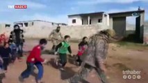 ÖSO mensupları, YPG/PKK'dan kurtarılan köydeki çocuklarla top oynadı
