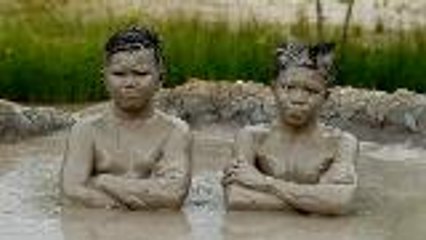 Take a dip in "mud volcanoes"