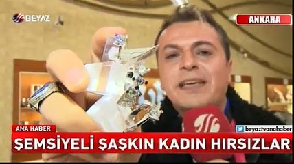 Şemsiyeli şaşkın hırsızlar