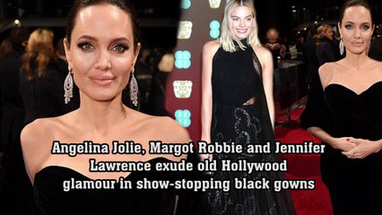 Скачать видео: Angelina Jolie, Margot Robbie and Jennifer Lawrence exude old Hollywood glamour in show-stopping black gowns as they lead Britain's first major Time's Up protest on the BAFTA red carpet.