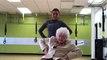 Senior Citizen Performs Dance Routine in Chair