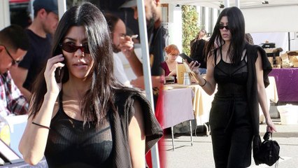 A sheer delight! Kourtney Kardashian strolls through a farmer's market in a see-through top and Yeezy kicks.
