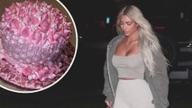'Mom of three': Kim Kardashian flaunts her slim waist after welcoming baby girl via surrogate...as Kris Jenner sends her a pink cake.