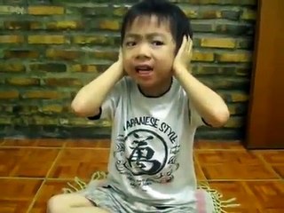 Japanische Kinder lesen  (Sura Al-Nas)