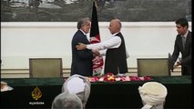 Afghan presidential rivals sign unity deal