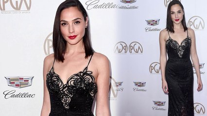Looking wonderful! Gal Gadot puts on stunning display in plunging black gown at Producers Guild Awards.