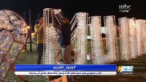 شاب سعودي يعيد تدوير قوارير الماء ليجعل منها منظر حضاري في مدينته