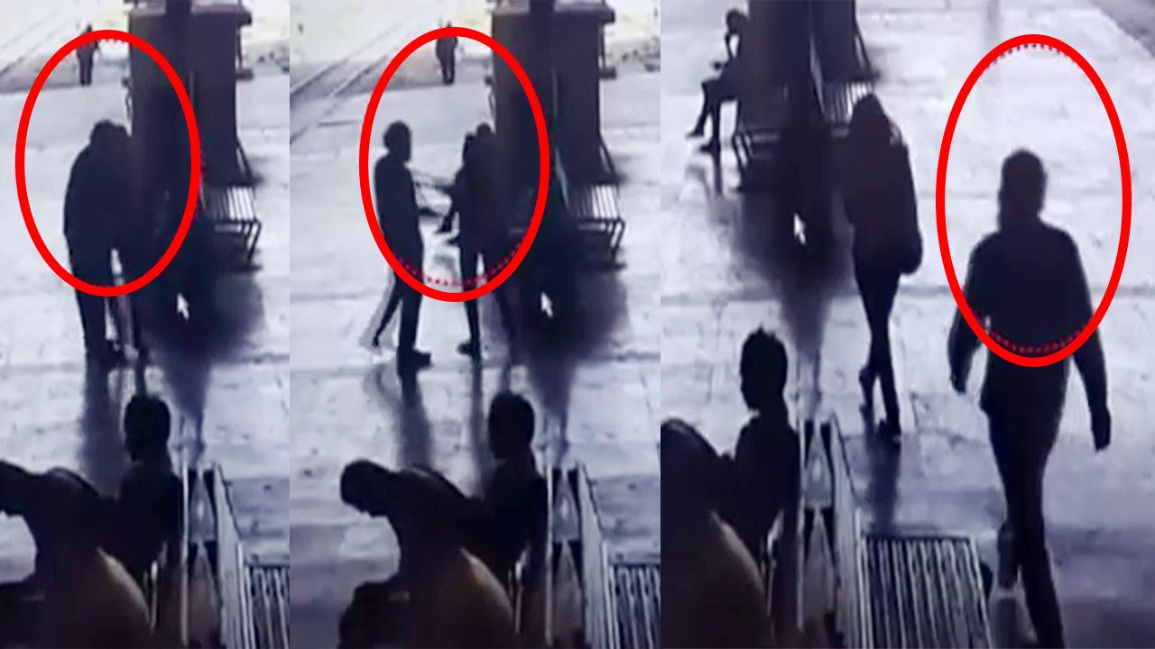 Mumbai : Man forcefully kiss woman on railway platform, incident caught on CCTV | Oneindia News