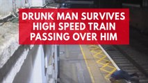 Watch this drunk man narrowly escaped death as train speeds past over his body