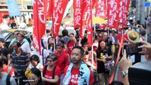 Hong Kong: Crowds protest jailing of Umbrella Movement leaders