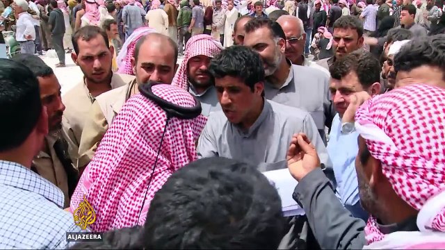 Thousands of displaced Syrians stuck in camps after fleeing Raqqa