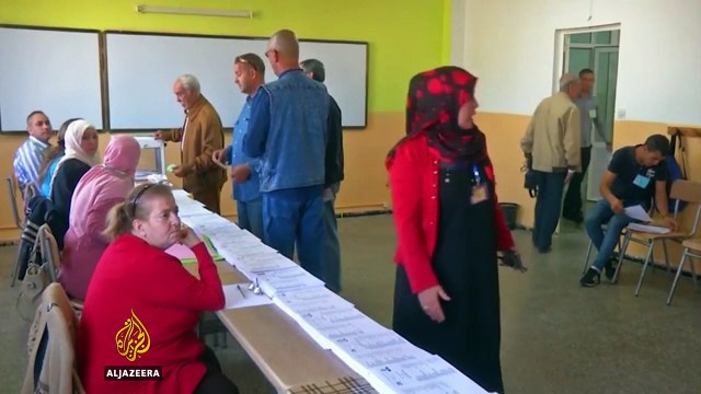 Algeria's National Liberation Front wins majority in parliamentary elections