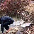 Guy Falls Through Ice Sheet Into Lake