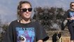 Miley Cyrus is rock star chic as she wears Guns N' Roses tee during hike with pet pooch Mary Jane in Los Angeles.