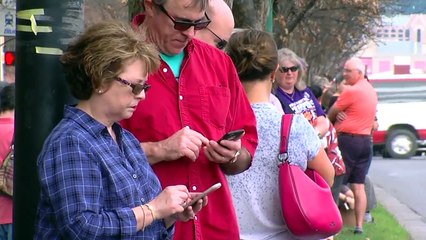 Crowds Line the Streets to Pay Respects Watching Billy Graham Motorcade