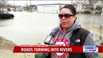 Michigan Residents Take Advantage of Record Flooding by Kayaking, Boating Through Waters