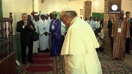 Pope Francis concludes Africa visit with prayers at Bangui mosque and open-air Mass