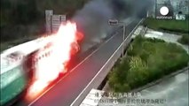 Driver steers flaming truck through tunnel, China