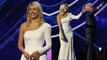 Ice, ice baby: Holly Willoughby flashes her slender legs in a stunning figure-hugging white gown as she glams up for DOI.