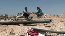 Palestinians struggle amid the rubble of Gaza