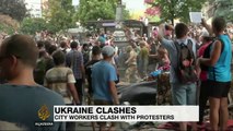 Protests erupt in Ukraine as clashes continue in east