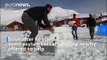 Igloo village built by migrants hands lifeline to dying Italian ski resort