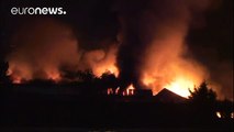 Over 100 firefighters tackle massive warehouse fire in London