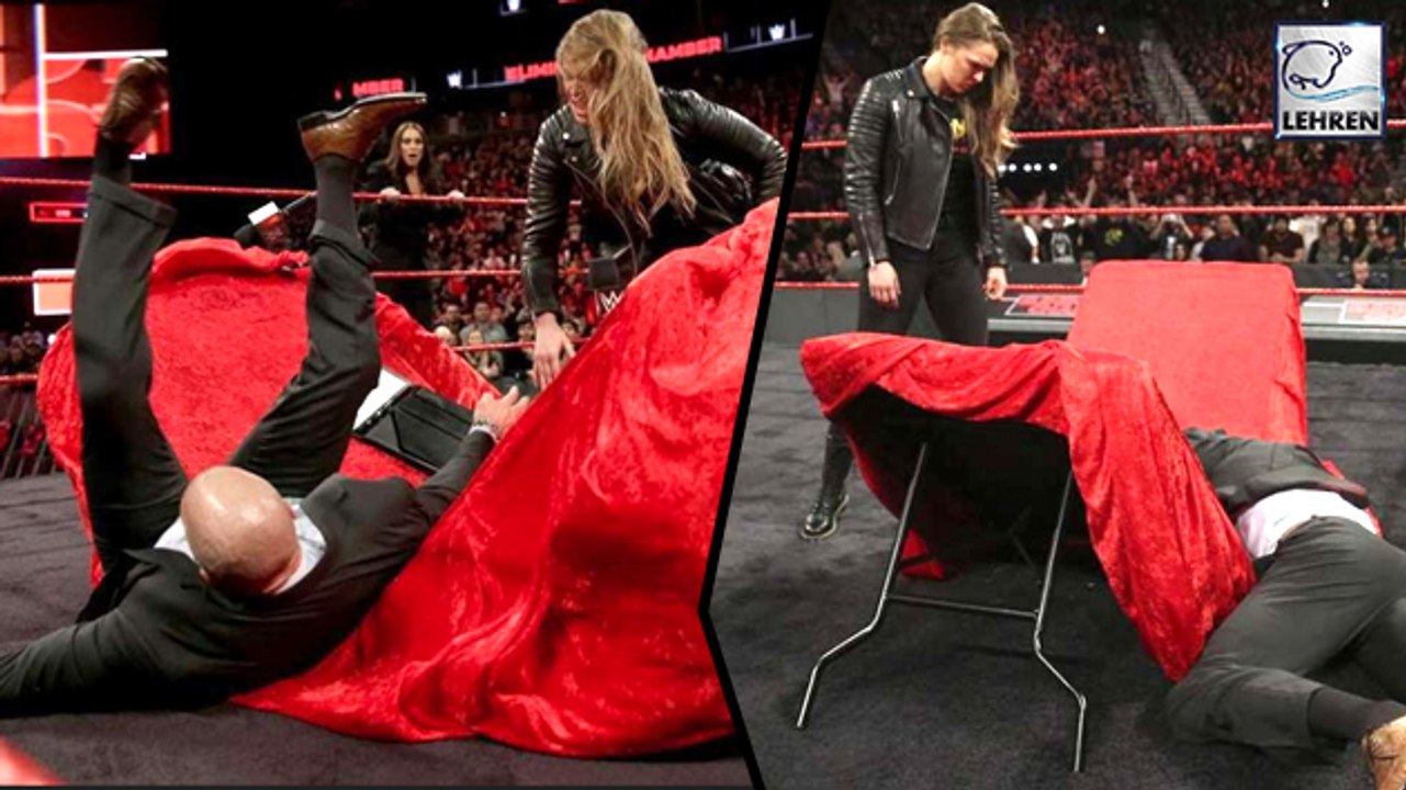 Ronda Rousey Throws Triple H Through A Table At WWE’s Elimination Chamber