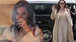 She's heaven scent! Stunning Angelina Jolie oozes glamour in a chic trench coat and plunging bodysuit as she films for perfume commercial in Paris.