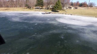 Drone Captures Snowmobile Breaking Through Ice