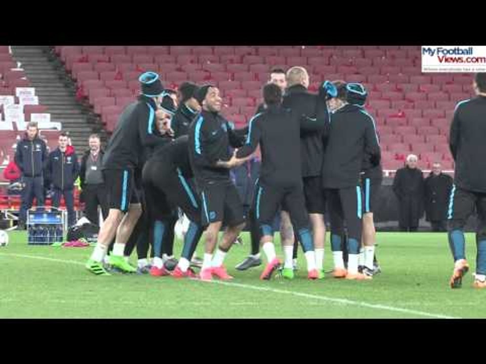 Luis Suarez mobbed by Barcelona team-mates in training