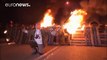 Tempers flare as protesting prison guards clash with police near Paris