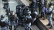 Police beat protester during Moscow anti-corruption protest