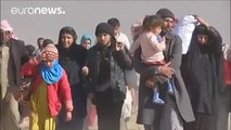 Iraqi forces push deeper into western Mosul as civilians flee