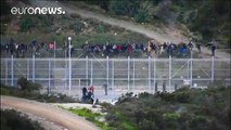 Migrants storm border fence into Spain's Ceuta enclave