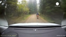 Dashcam: Police car runs over motorcyclist during chase, Lithuania