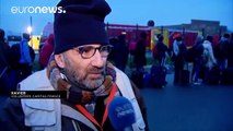 Calm prevails as first migrants leave Calais 'jungle' voluntarily