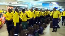 300 SA firefighters sing & dance at Canada airport, ready to battle Fort McMurray fire